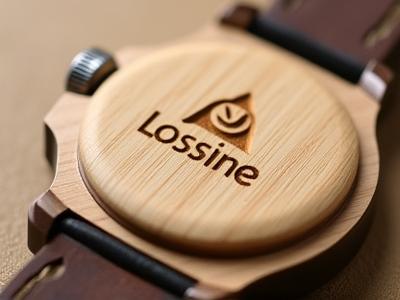 Engraved wooden watch with a small custom logo