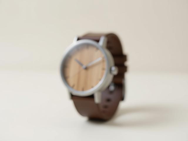 Hybrid watch showcasing a unique blend of light and dark wood with steel case and minimalist dial