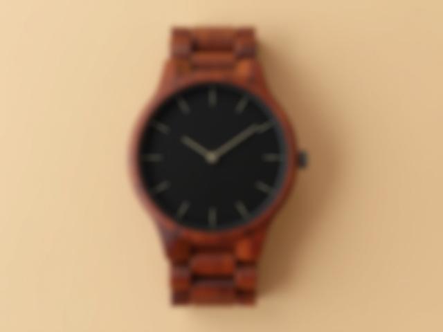 Germaine J Thomas Sandalwood Clarity minimalist wooden watch with rich brown sandalwood and a minimalist black dial.